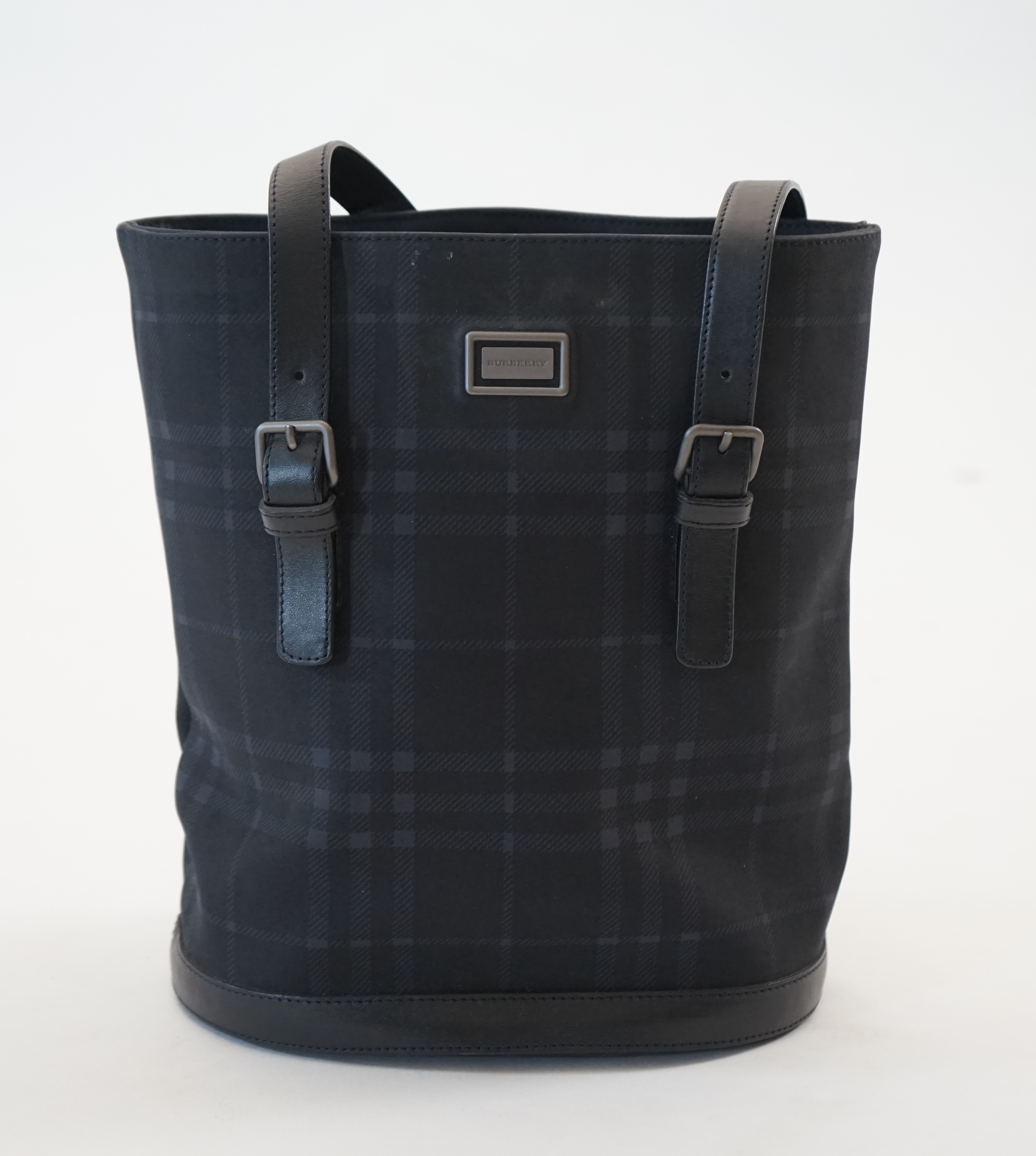 A Burberry bucket bag in blue black tartan canvas and leather, width 26cm, depth 16cm, height 27cm